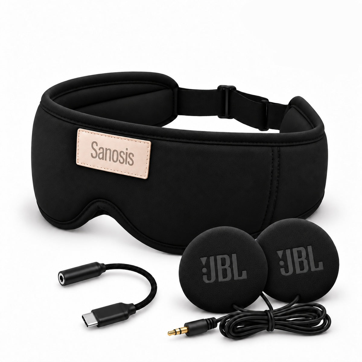 Sanosis black sleep headphones with an adjustable strap, shown with two round black ear cushions, a USB-C to 3.5mm cable, and a beige brand patch on a white background.