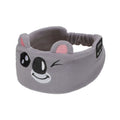 Gray sleep mask headphones with cartoon face design on a white background