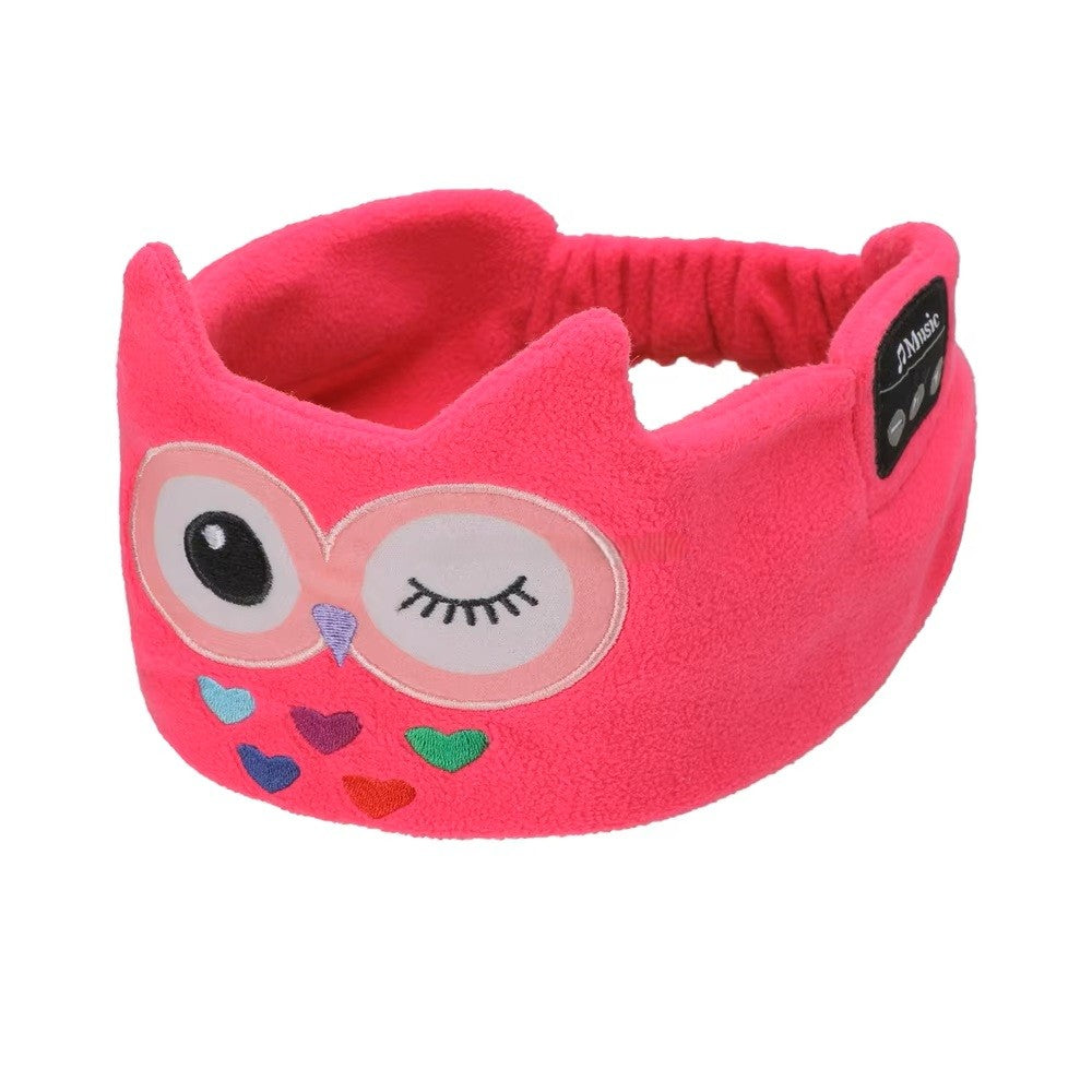 Pink sleep mask headphones with owl design on a white background