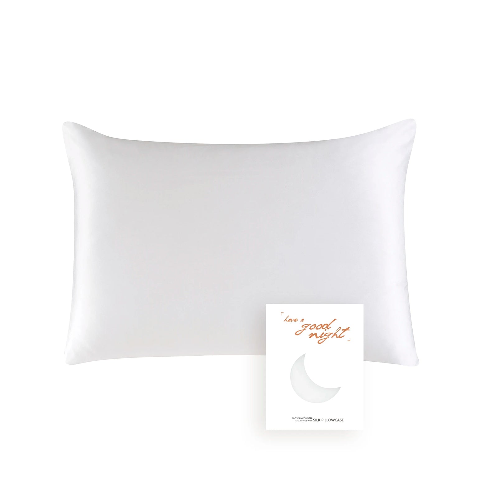 White pillow with 'Good Night' card on a white background