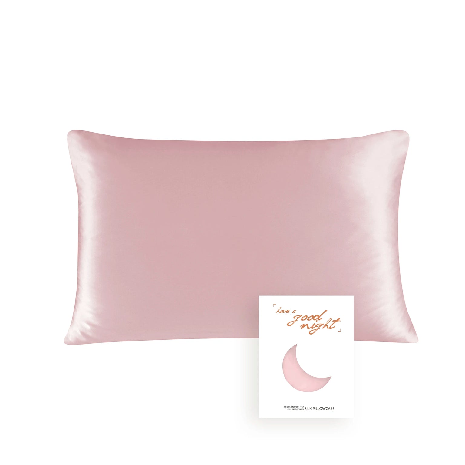 Silky pink pillowcase with a card on a white background