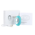 White and teal electronic device with USB cable on a white background