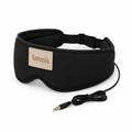 A black Sanosis sleep mask with an adjustable strap and a connected audio cable, featuring a beige brand patch on the front, set against a plain white background.