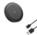 Black wireless charging pad with USB cable on a white background