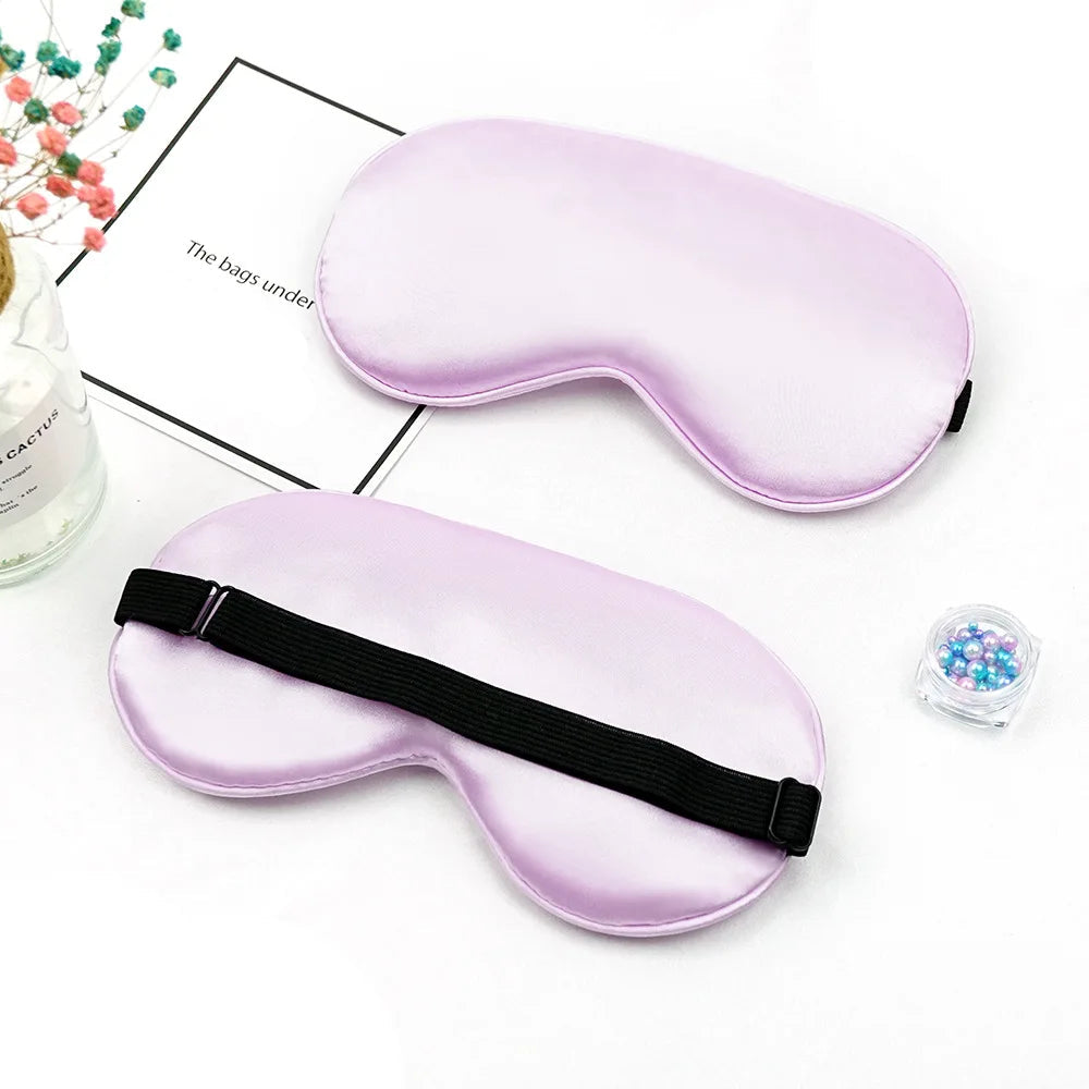 Purple sleep mask on a white surface