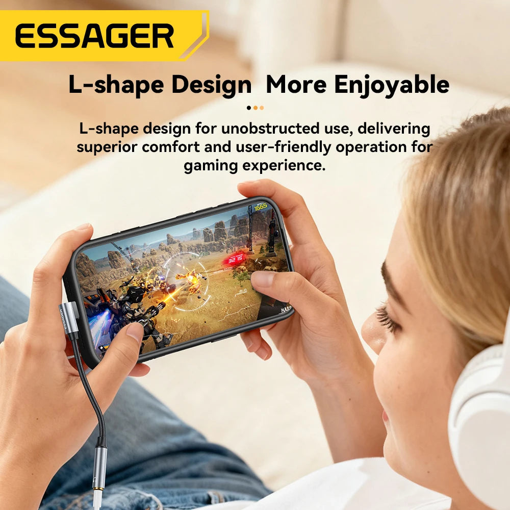 Person playing a game on a smartphone with an L-shaped design feature highlighted.